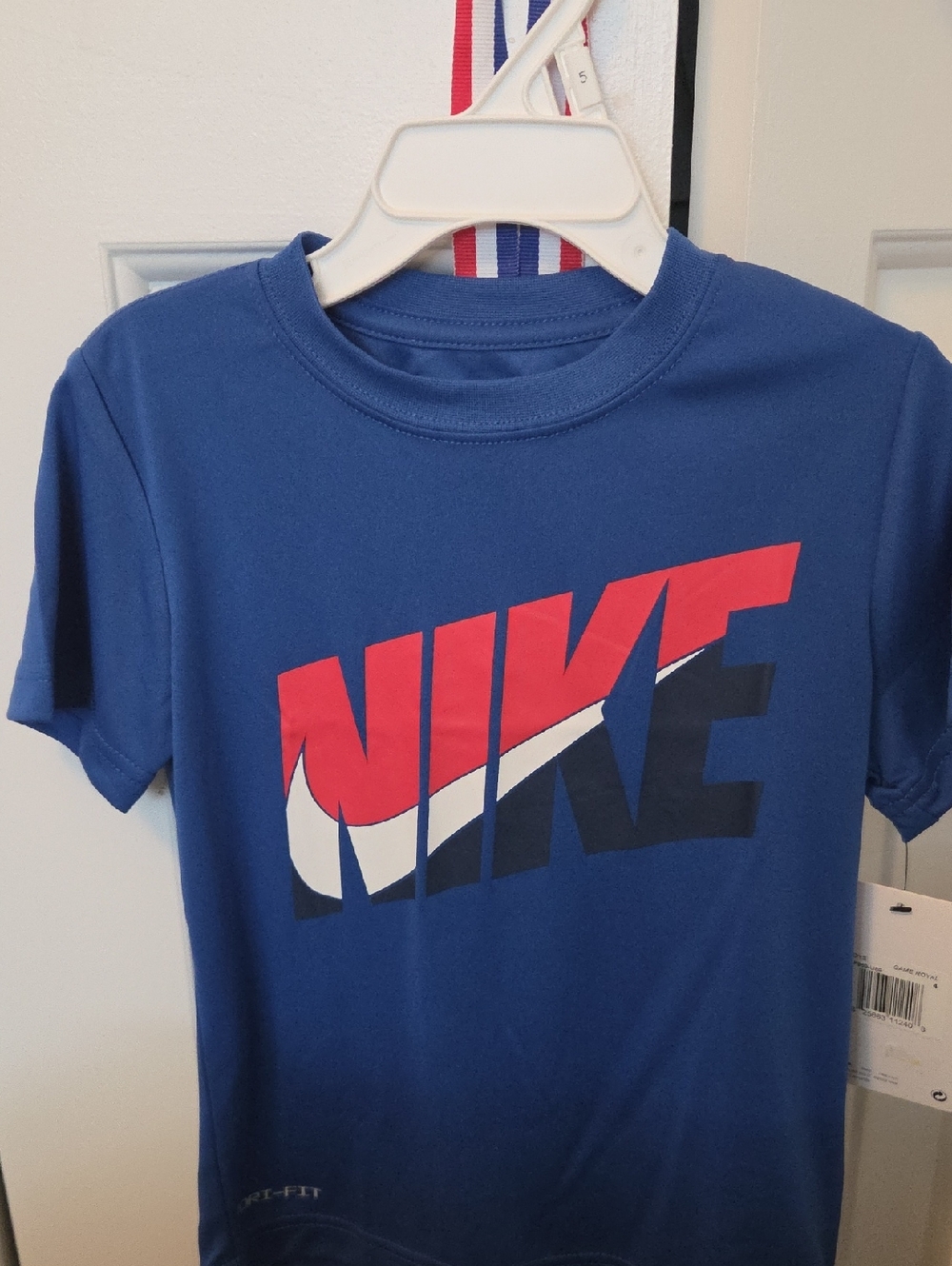 Nike Blue Short-Sleeve Logo Tee with Red and White Accent